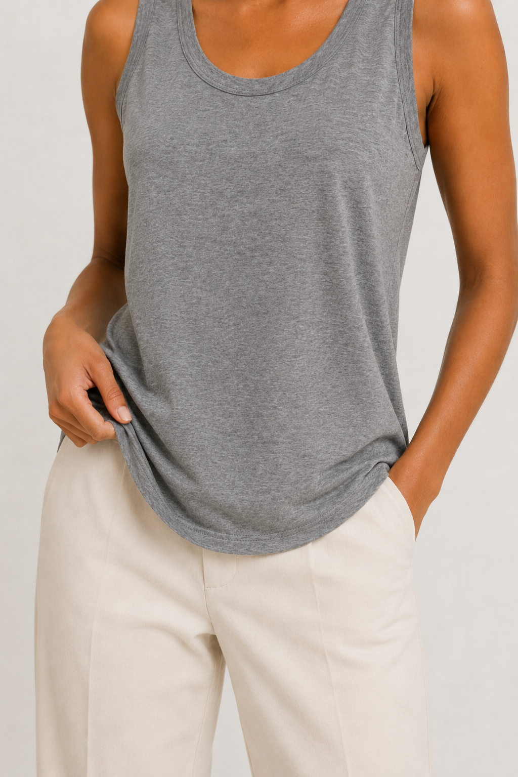 Woman wearing the Lohnr Zarah Tank with a scoop neck and effortless fit