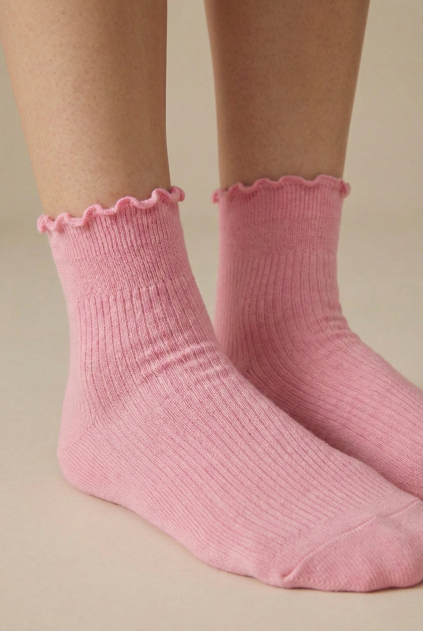 LOHNR Lacey Sock in Petal - A deep rose pink stretch crew sock crafted from a breathable cotton blend, finished with a feminine ruffle-edge and secure stay-up fit.