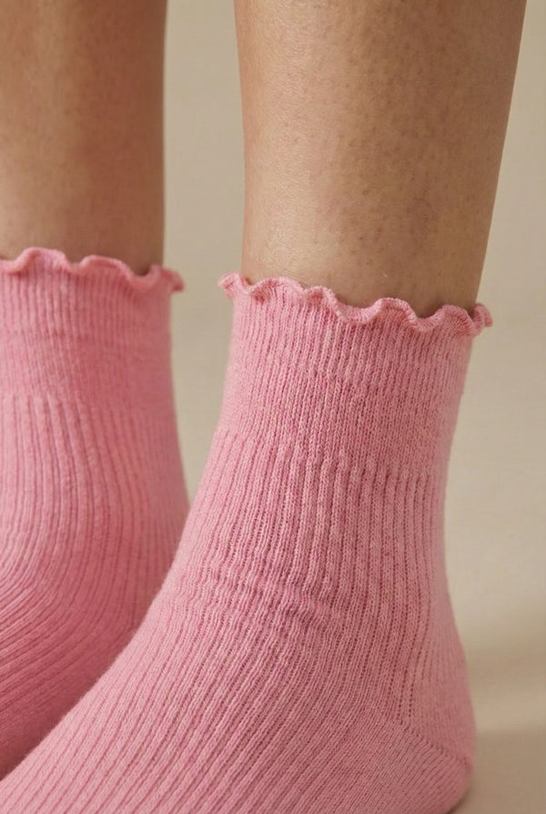 LOHNR Lacey Sock in Petal - A deep rose pink stretch crew sock crafted from a breathable cotton blend, finished with a feminine ruffle-edge and secure stay-up fit.
