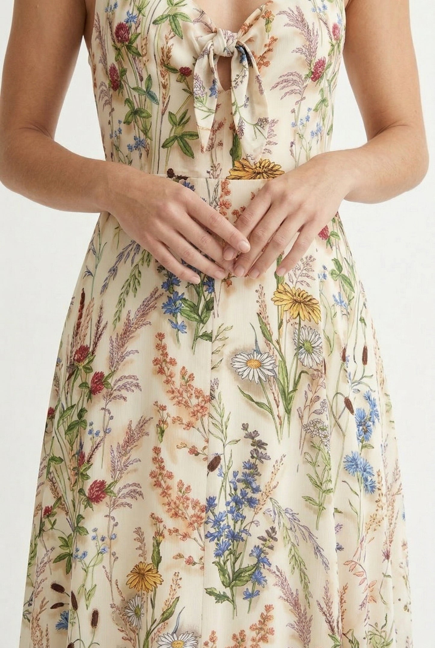 Model wearing the LOHNR Light Birch floral maxi dress