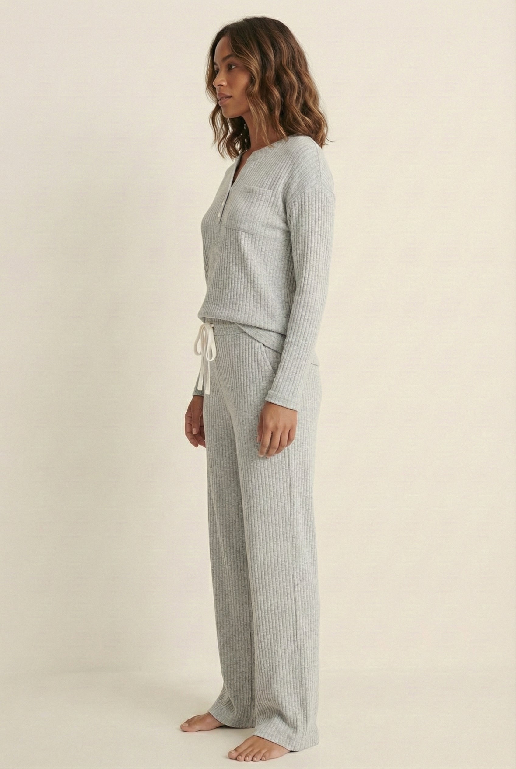 Women's Linea Set by LOHNR in Mist. A premium matching lounge set featuring a smooth, sweatshirt-material henley top and tailored comfortable joggers.