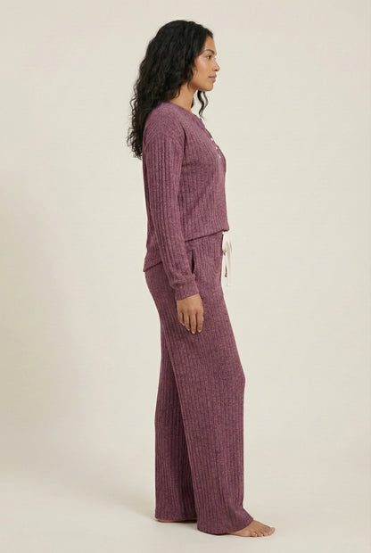 Women's Linea Set by LOHNR in Mulberry. A premium matching lounge set featuring a smooth, sweatshirt-material henley top and tailored comfortable joggers.