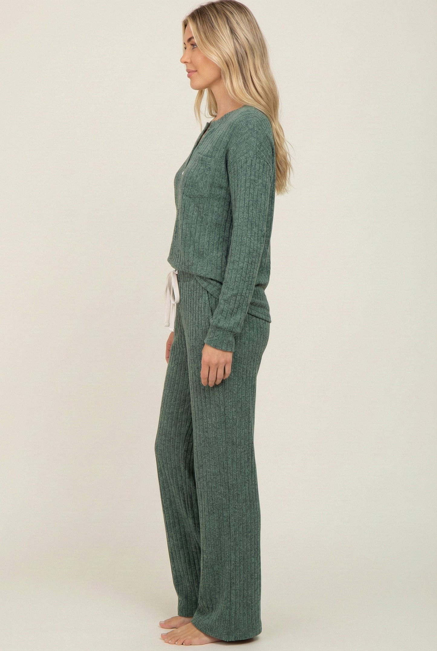 Women's Linea Set by LOHNR in Sage. A premium matching lounge set featuring a smooth, sweatshirt-material henley top and tailored comfortable joggers.