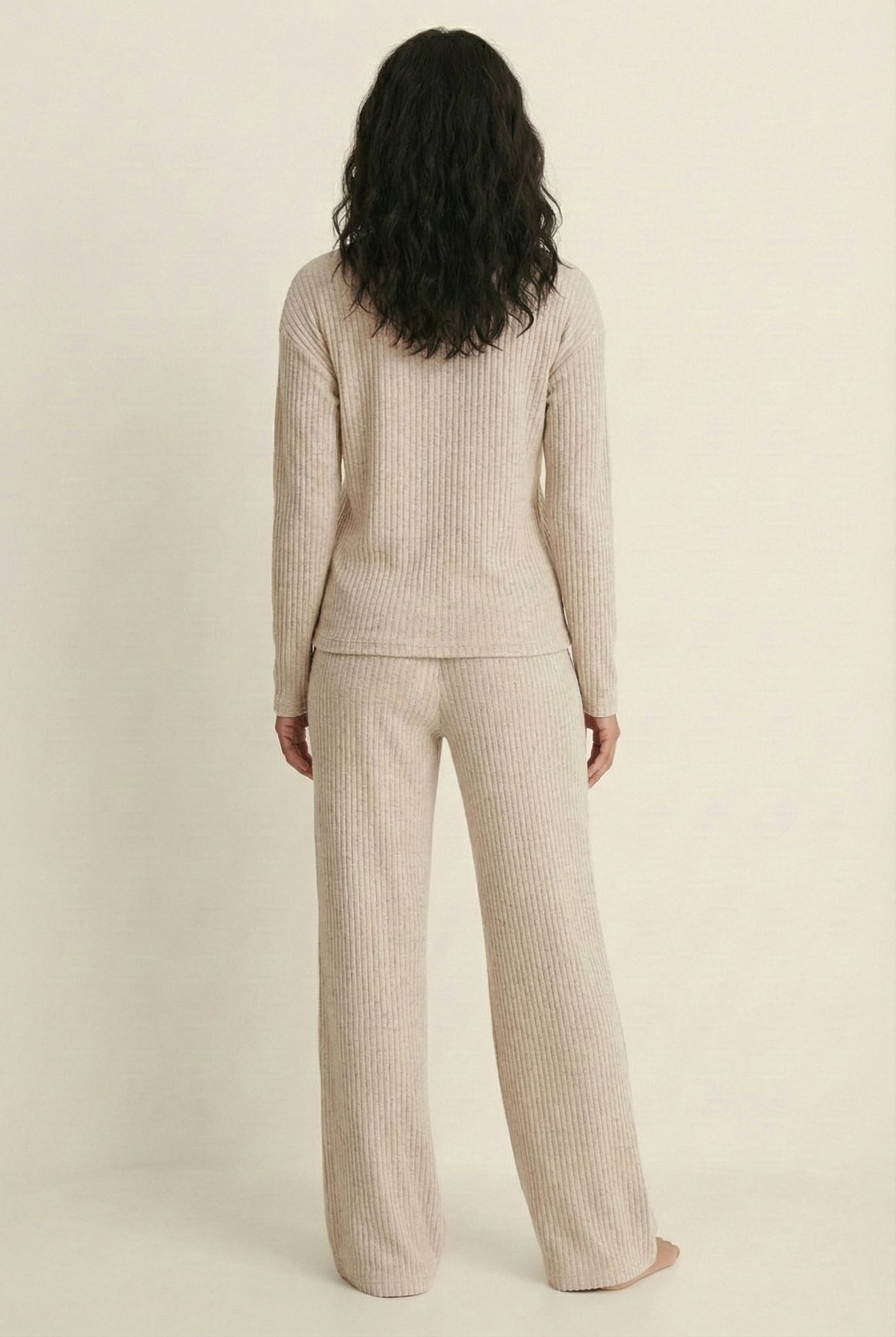 Women's Linea Set by LOHNR in Soft Apricot. A premium matching lounge set featuring a smooth, sweatshirt-material henley top and tailored comfortable joggers.