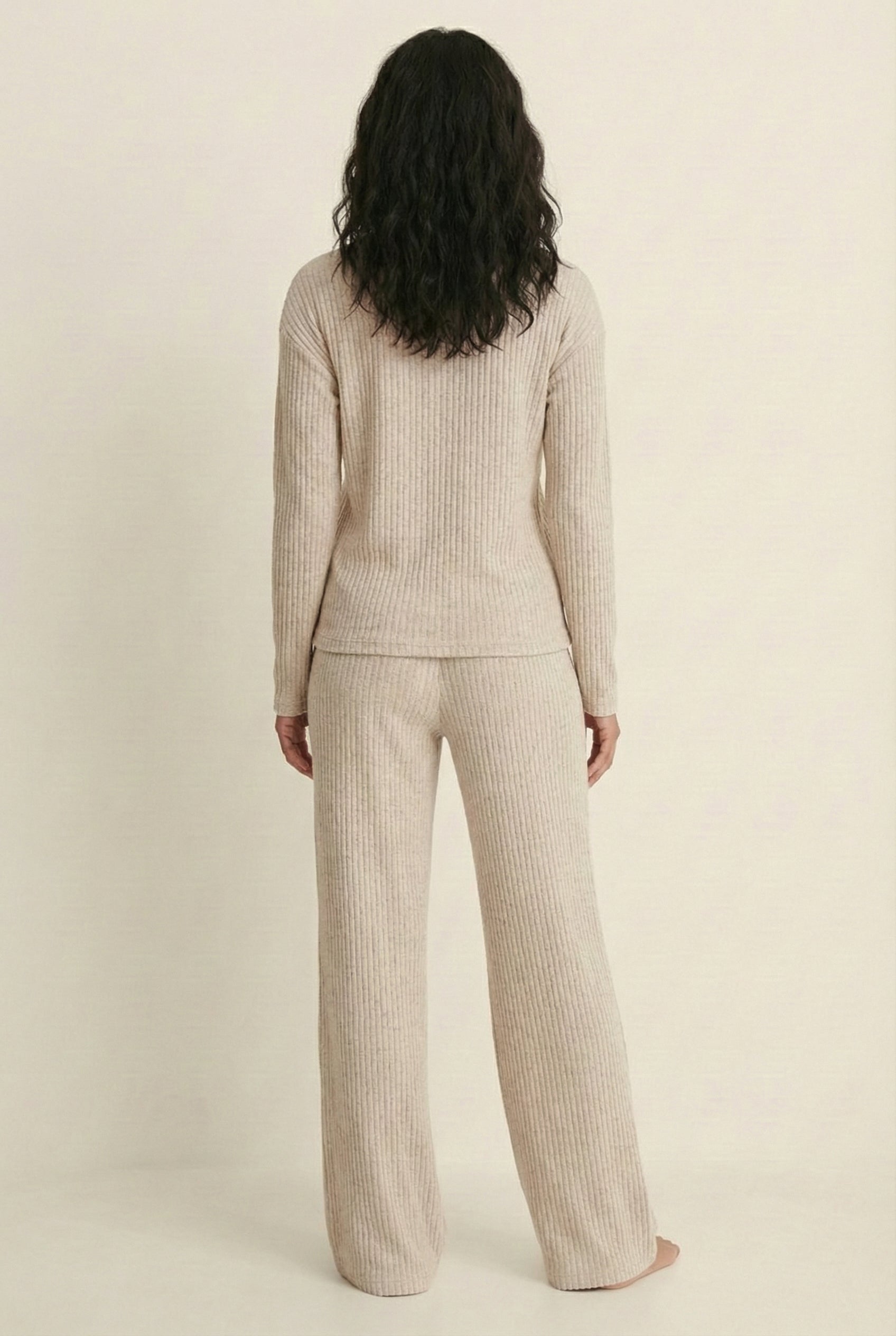 Women's Linea Set by LOHNR in Soft Apricot. A premium matching lounge set featuring a smooth, sweatshirt-material henley top and tailored comfortable joggers.