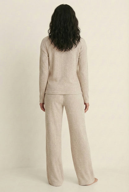 Women's Linea Set by LOHNR in Soft Apricot. A premium matching lounge set featuring a smooth, sweatshirt-material henley top and tailored comfortable joggers.