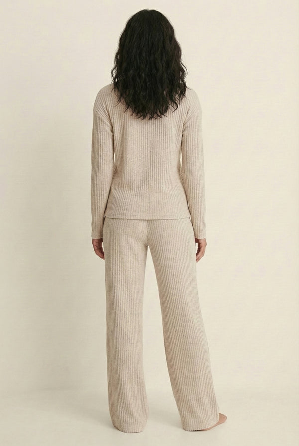 Women's Linea Set by LOHNR in Soft Apricot. A premium matching lounge set featuring a smooth, sweatshirt-material henley top and tailored comfortable joggers.