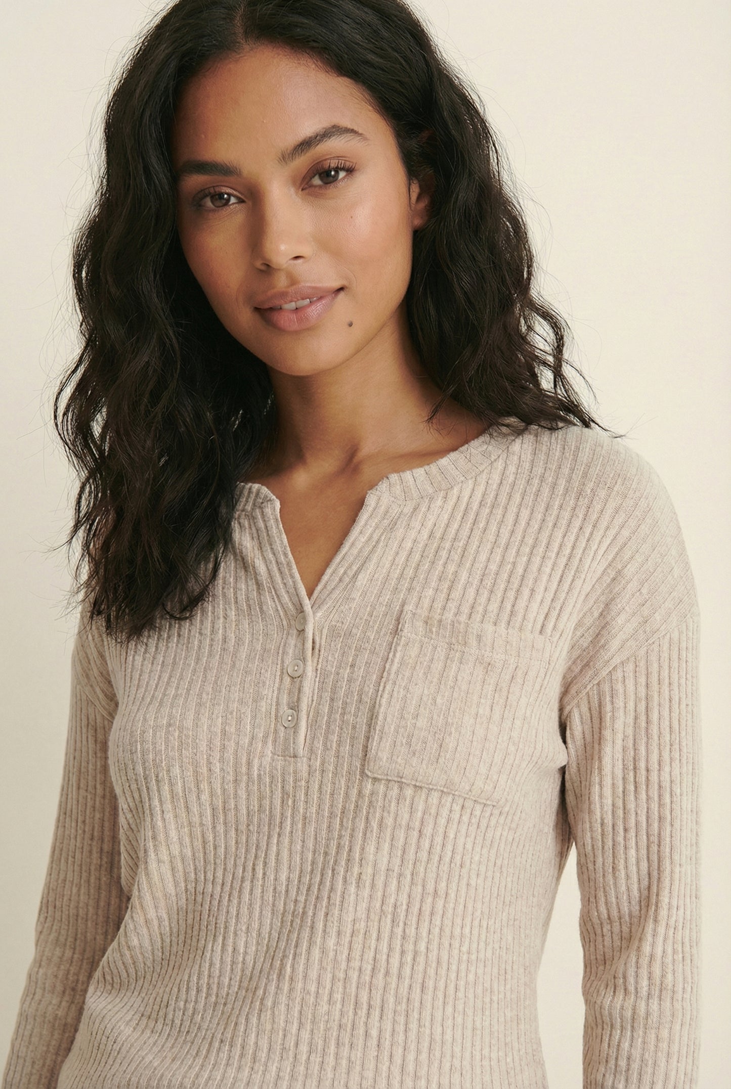 Women's Linea Set by LOHNR in Soft Apricot. A premium matching lounge set featuring a smooth, sweatshirt-material henley top and tailored comfortable joggers.