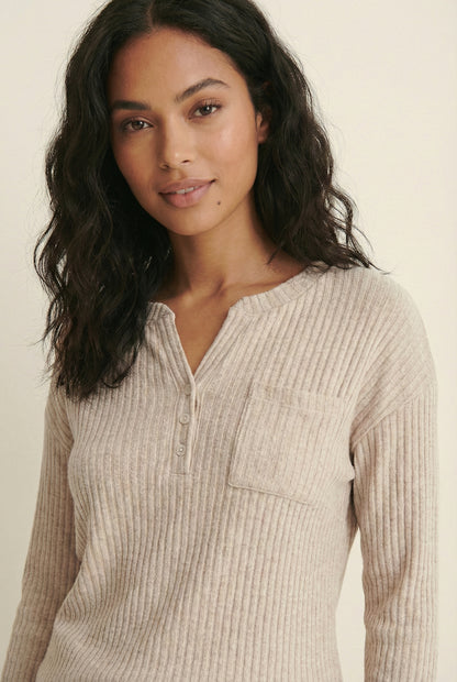 Women's Linea Set by LOHNR in Soft Apricot. A premium matching lounge set featuring a smooth, sweatshirt-material henley top and tailored comfortable joggers.