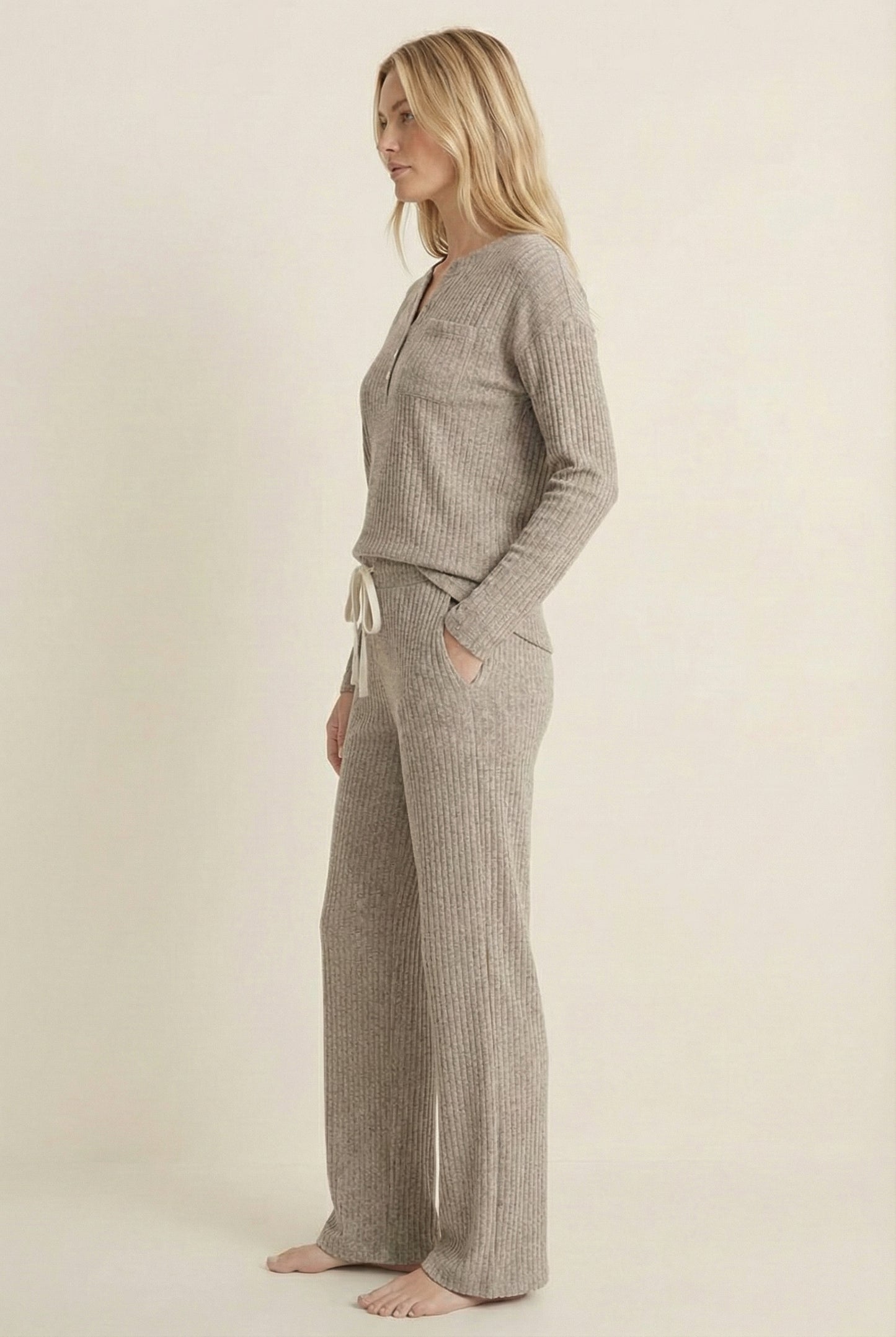 Women's Linea Set by LOHNR in Truffle. A premium matching lounge set featuring a smooth, sweatshirt-material henley top and tailored comfortable joggers.