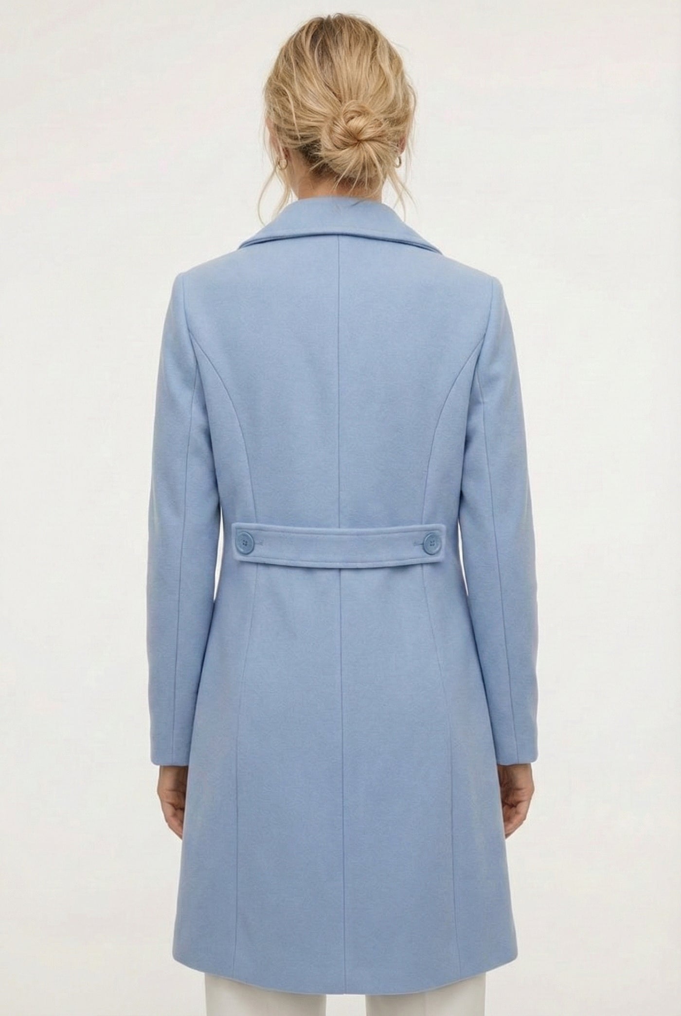 Coast light blue Mercer Coat by LOHNR, a tailored faux wool trench coat featuring structured lapels, deep utility pockets, and a refined quiet luxury aesthetic.