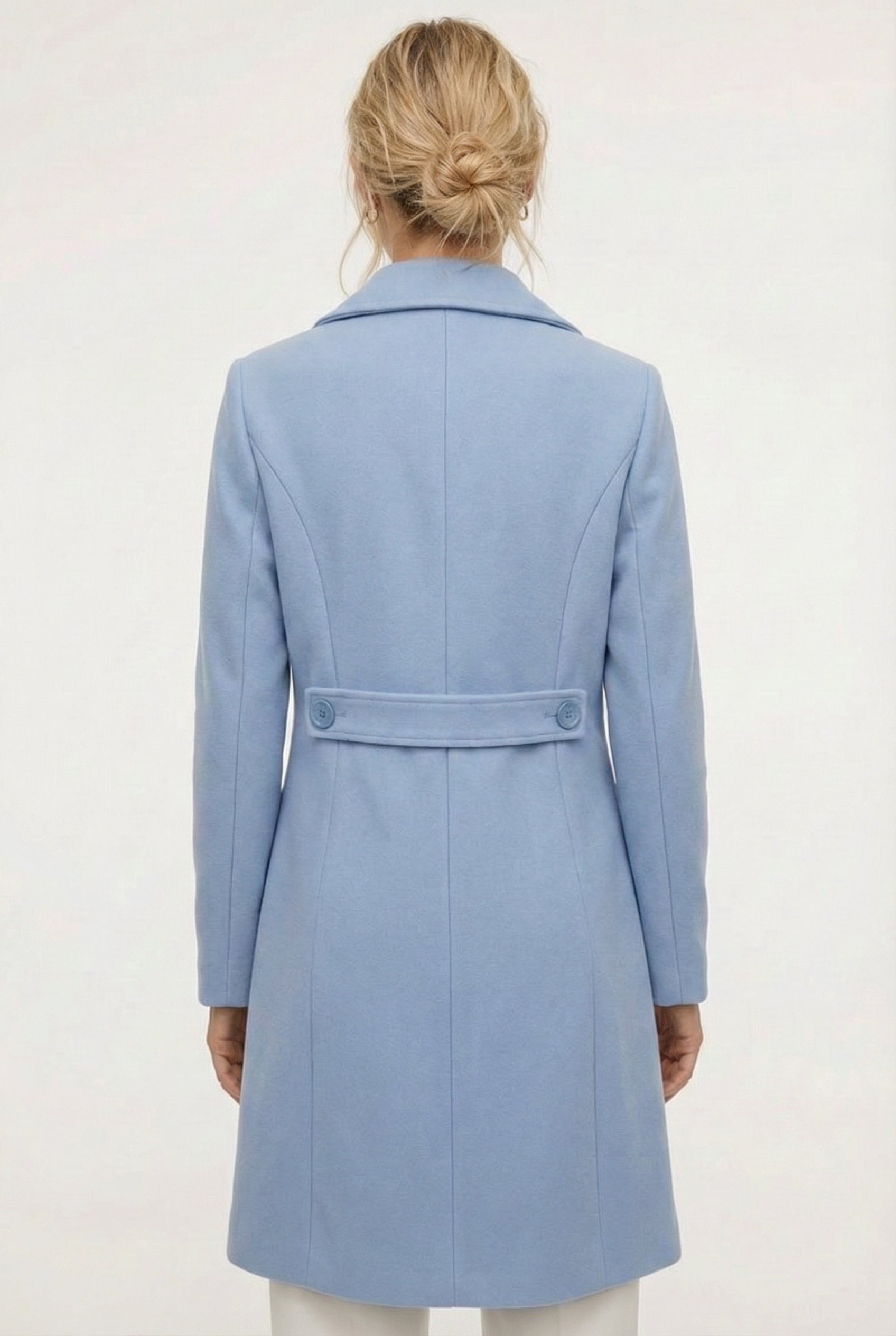 Coast light blue Mercer Coat by LOHNR, a tailored faux wool trench coat featuring structured lapels, deep utility pockets, and a refined quiet luxury aesthetic.