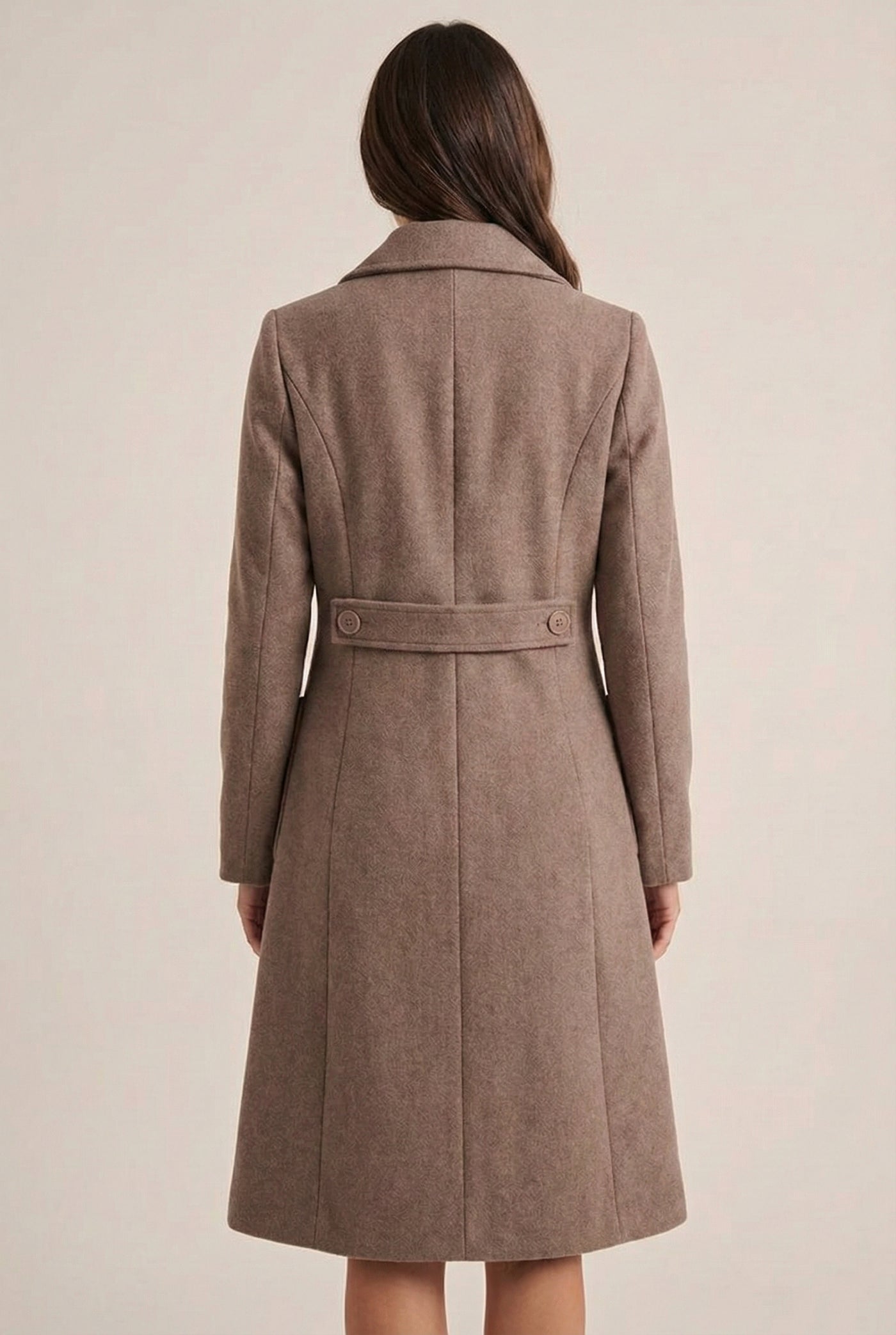 Fawn taupe Mercer Coat by LOHNR, a tailored faux wool trench coat featuring structured lapels, deep utility pockets, and a refined quiet luxury aesthetic.