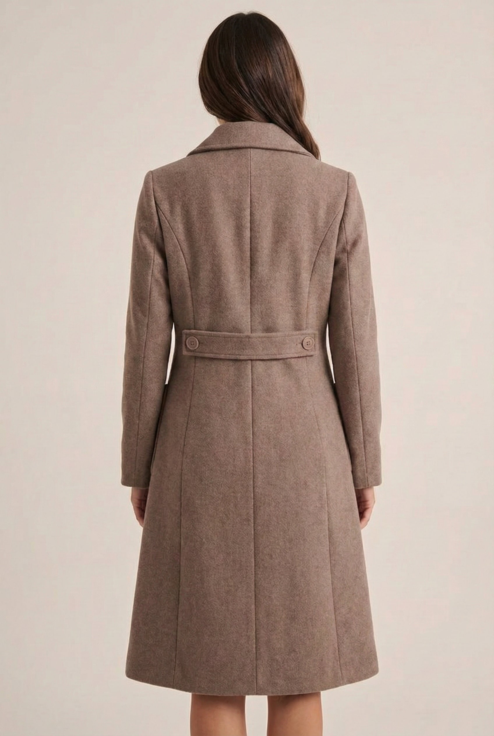 Fawn taupe Mercer Coat by LOHNR, a tailored faux wool trench coat featuring structured lapels, deep utility pockets, and a refined quiet luxury aesthetic.