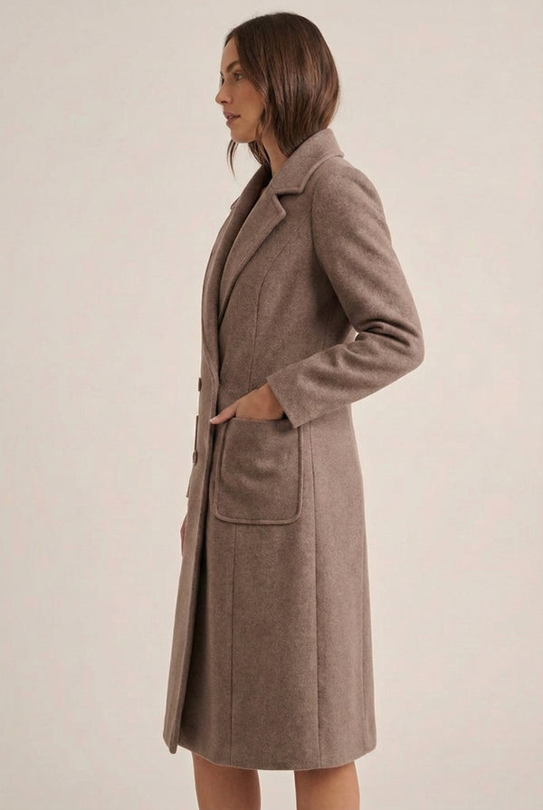 Fawn taupe Mercer Coat by LOHNR, a tailored faux wool trench coat featuring structured lapels, deep utility pockets, and a refined quiet luxury aesthetic.