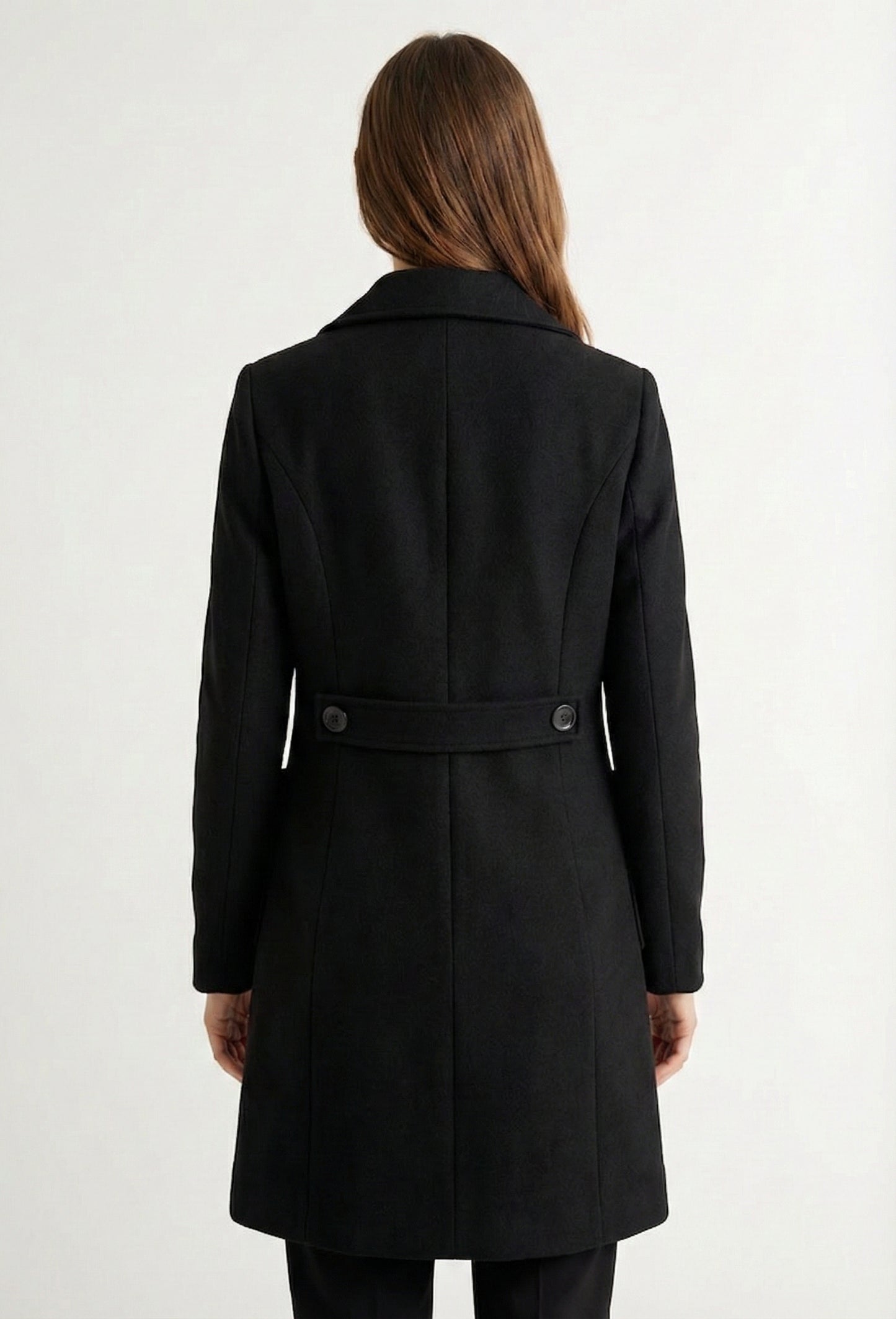 Onyx black Mercer Coat by LOHNR, a tailored faux wool trench coat featuring structured lapels, deep utility pockets, and a refined quiet luxury aesthetic.