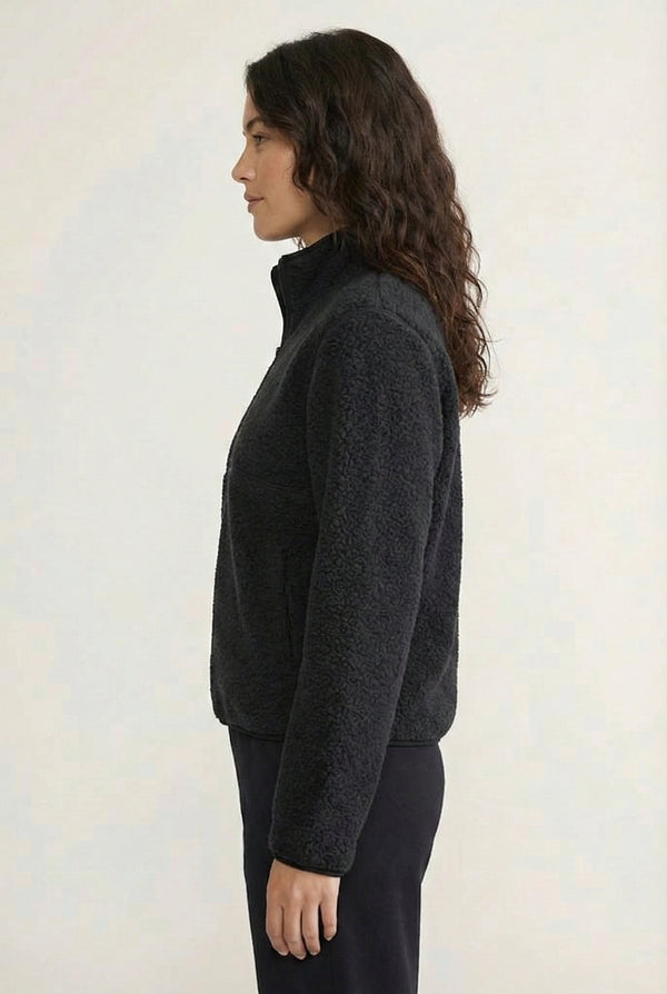 Women's Roam Sherpa Fleece Pullover in Onyx by LOHNR. A plush, half-zip layering piece with a structured collar.