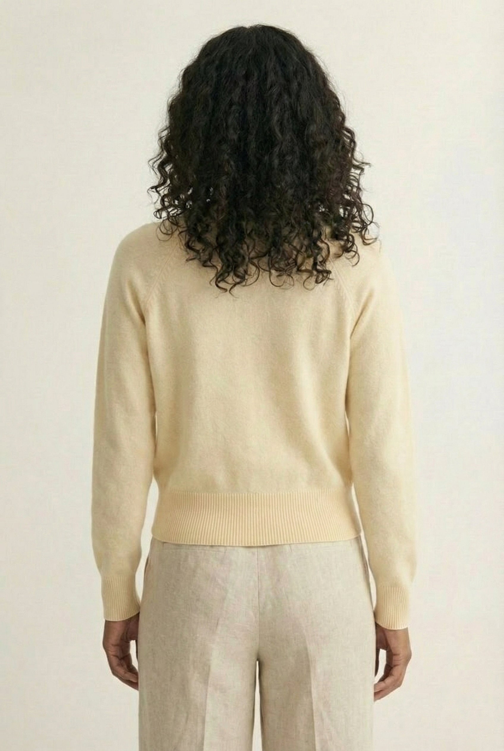 Women's smooth Roux Henley Sweater in Almond by LOHNR, featuring a relaxed blouson fit, dropped shoulders, and a half-button placket.
