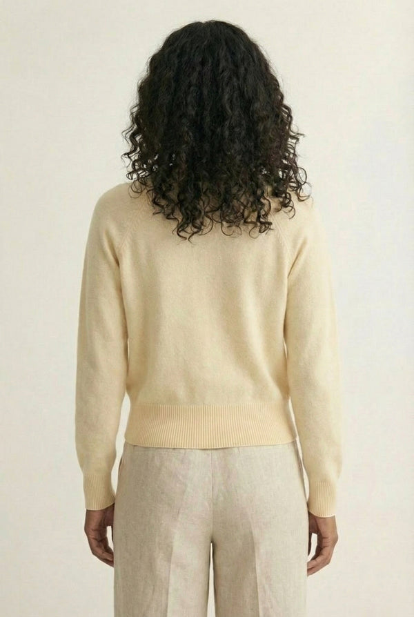 Women's smooth Roux Henley Sweater in Almond by LOHNR, featuring a relaxed blouson fit, dropped shoulders, and a half-button placket.