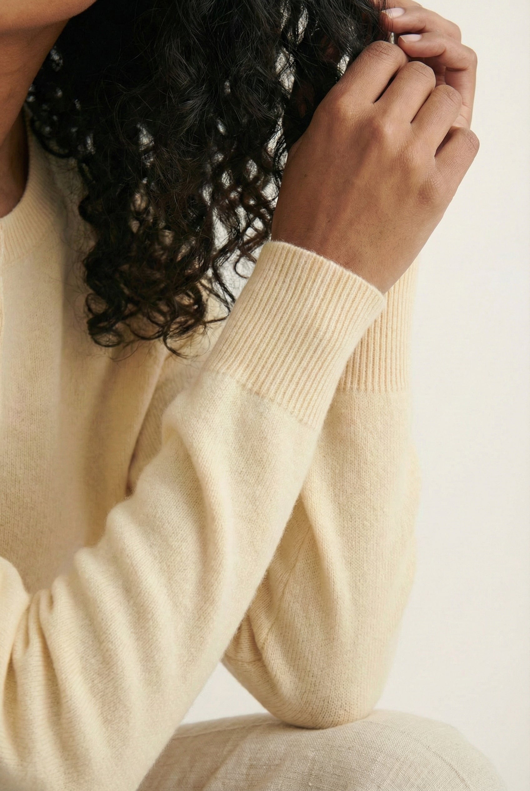Women's smooth Roux Henley Sweater in Almond by LOHNR, featuring a relaxed blouson fit, dropped shoulders, and a half-button placket.
