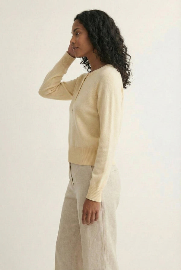 Women's smooth Roux Henley Sweater in Almond by LOHNR, featuring a relaxed blouson fit, dropped shoulders, and a half-button placket.