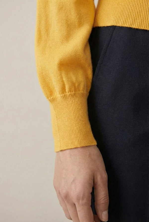 Women's smooth Roux Henley Sweater in Butter by LOHNR, featuring a relaxed blouson fit, dropped shoulders, and a half-button placket.