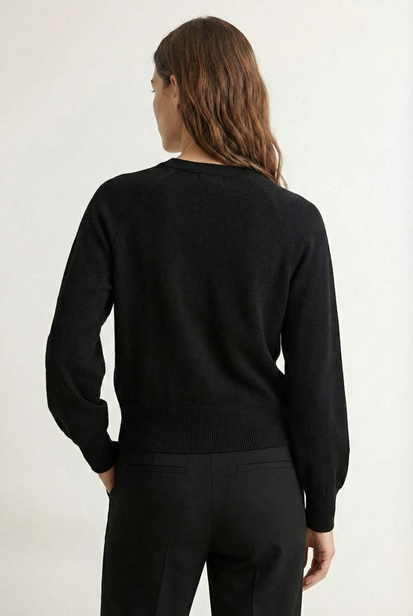 Women's smooth Roux Henley Sweater in Onyx by LOHNR, featuring a relaxed blouson fit, dropped shoulders, and a half-button placket.