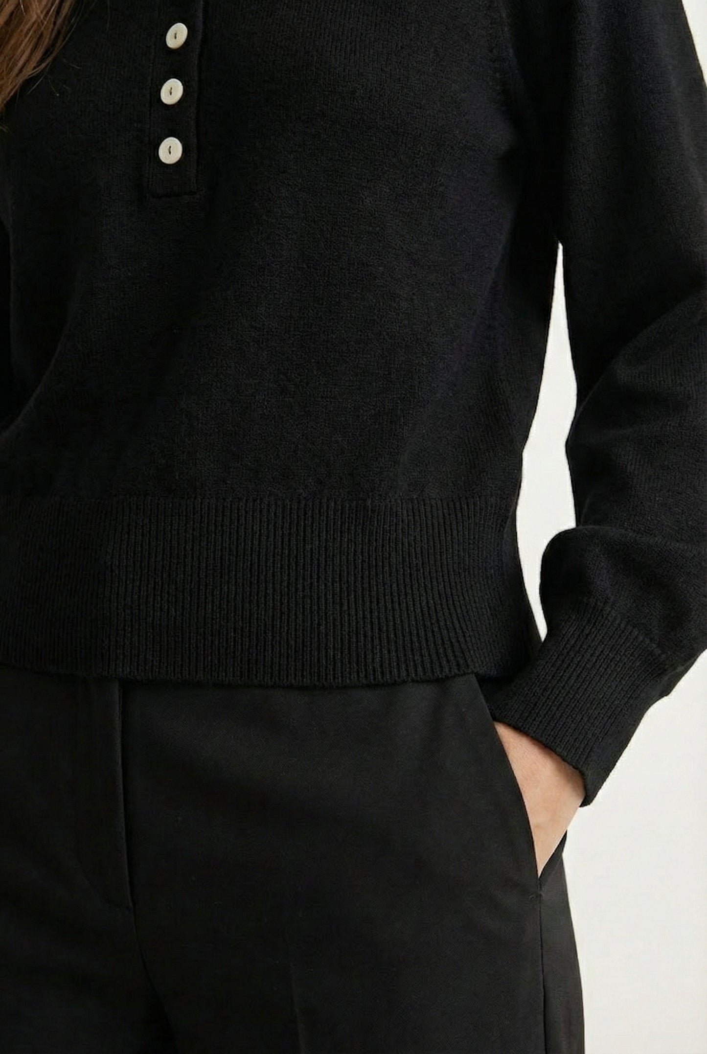 Women's smooth Roux Henley Sweater in Onyx by LOHNR, featuring a relaxed blouson fit, dropped shoulders, and a half-button placket.