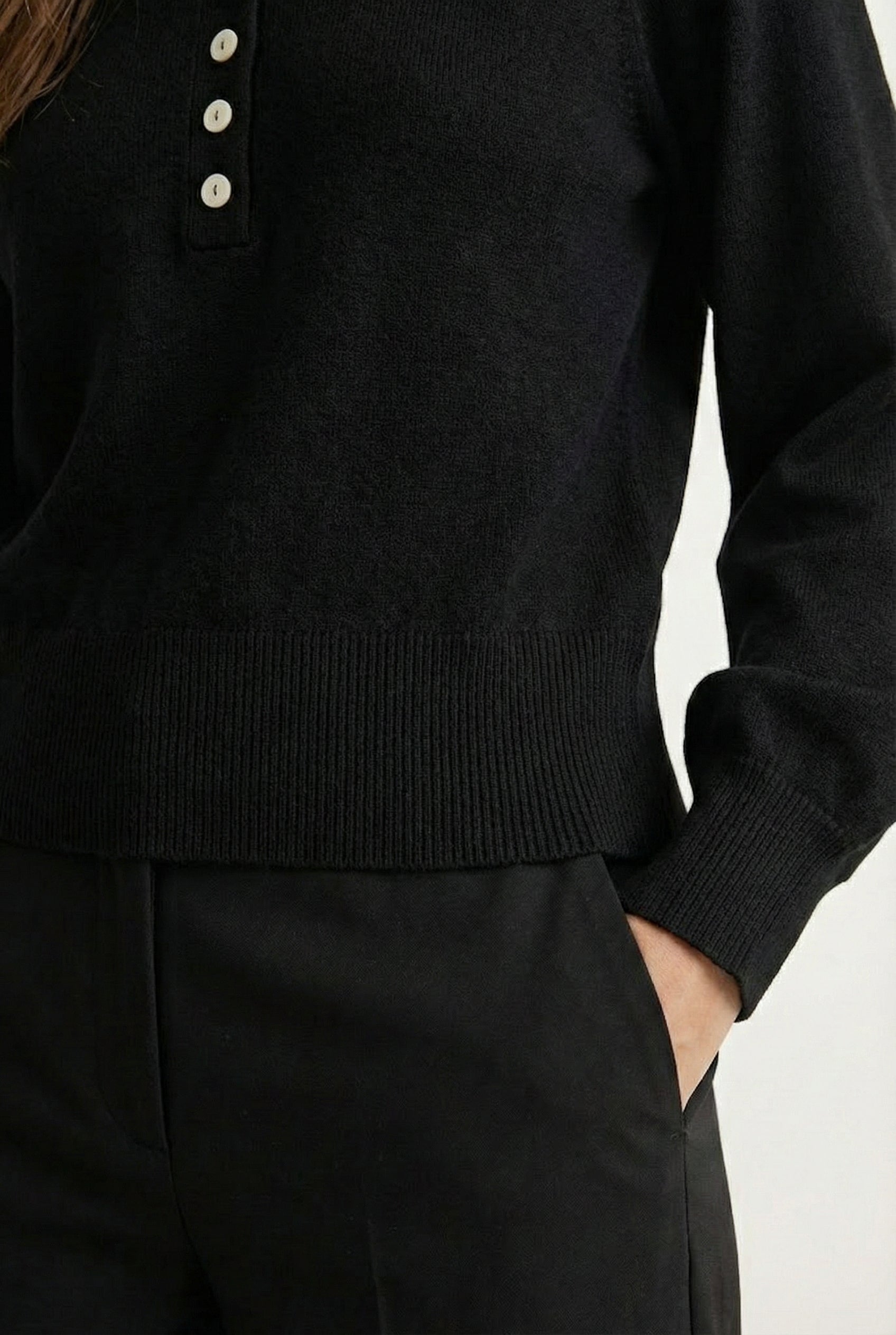 Women's smooth Roux Henley Sweater in Onyx by LOHNR, featuring a relaxed blouson fit, dropped shoulders, and a half-button placket.