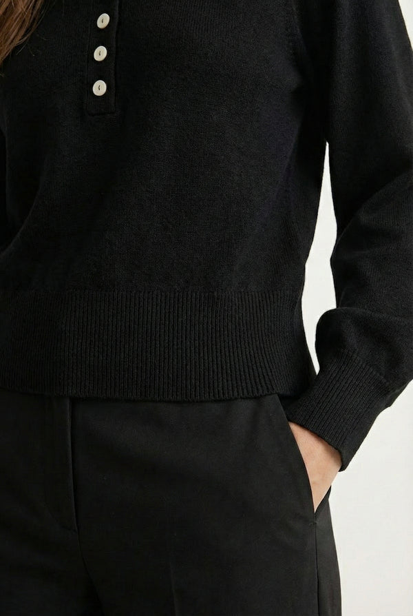 Women's smooth Roux Henley Sweater in Onyx by LOHNR, featuring a relaxed blouson fit, dropped shoulders, and a half-button placket.