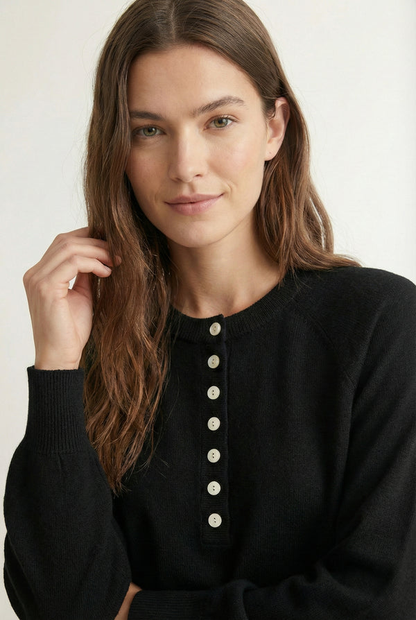Women's smooth Roux Henley Sweater in Onyx by LOHNR, featuring a relaxed blouson fit, dropped shoulders, and a half-button placket.
