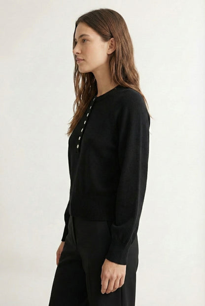 Women's smooth Roux Henley Sweater in Onyx by LOHNR, featuring a relaxed blouson fit, dropped shoulders, and a half-button placket.