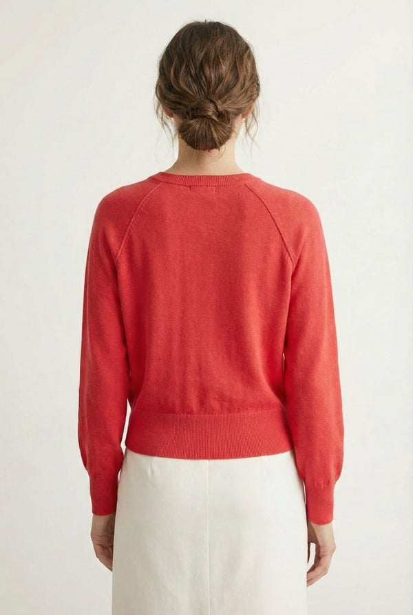 Women's smooth Roux Henley Sweater in Petal by LOHNR, featuring a relaxed blouson fit, dropped shoulders, and a half-button placket.