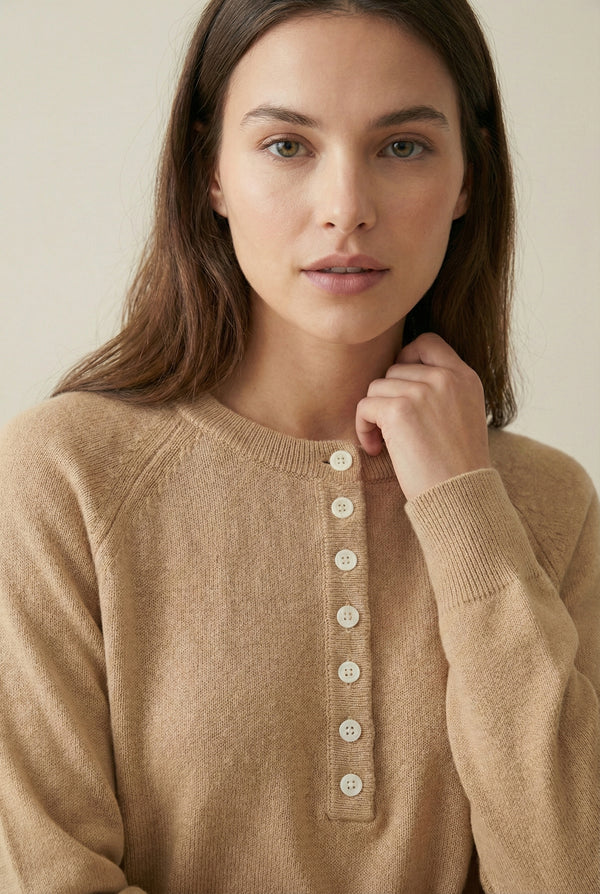 Women's smooth Roux Henley Sweater in Sandstone by LOHNR, featuring a relaxed blouson fit, dropped shoulders, and a half-button placket.