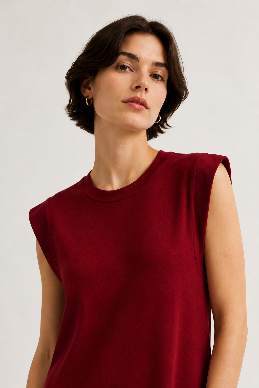 Professional studio shot of a model wearing the Lohnr Rowan Midi dress in Cabernet, featuring a premium relaxed drape and side split hem.