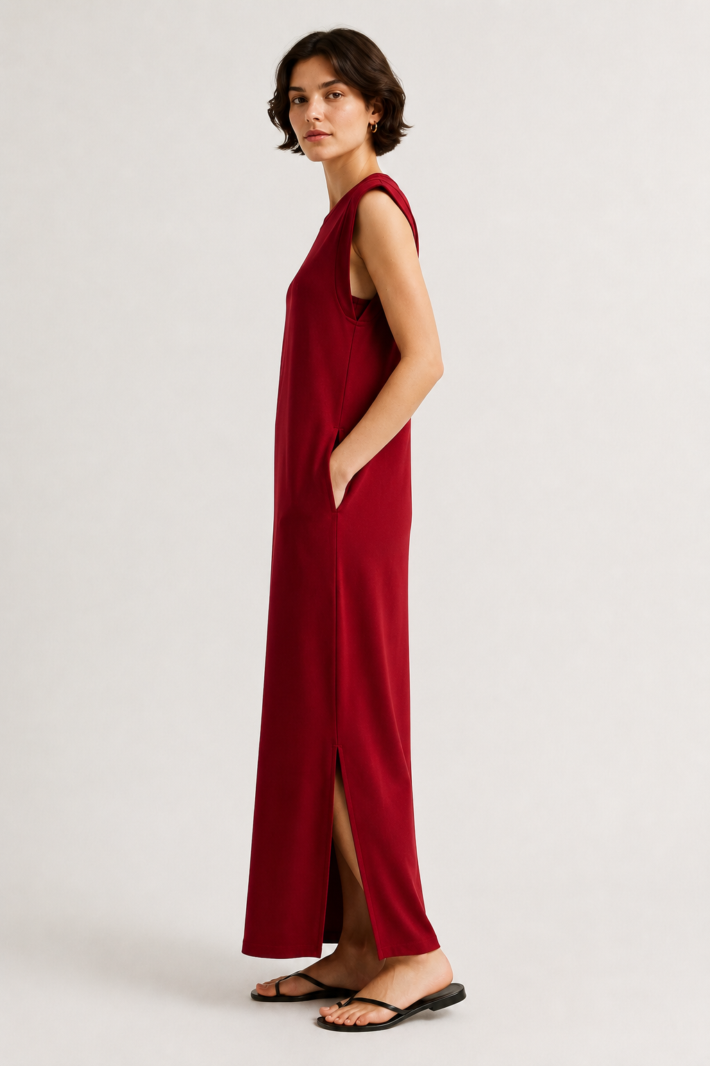 Professional studio shot of a model wearing the Lohnr Rowan Midi dress in Cabernet, featuring a premium relaxed drape and side split hem.