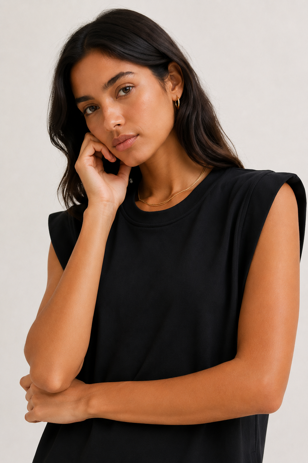 Professional studio shot of a model wearing the Lohnr Rowan Midi dress in Onyx, featuring a premium relaxed drape and side split hem.