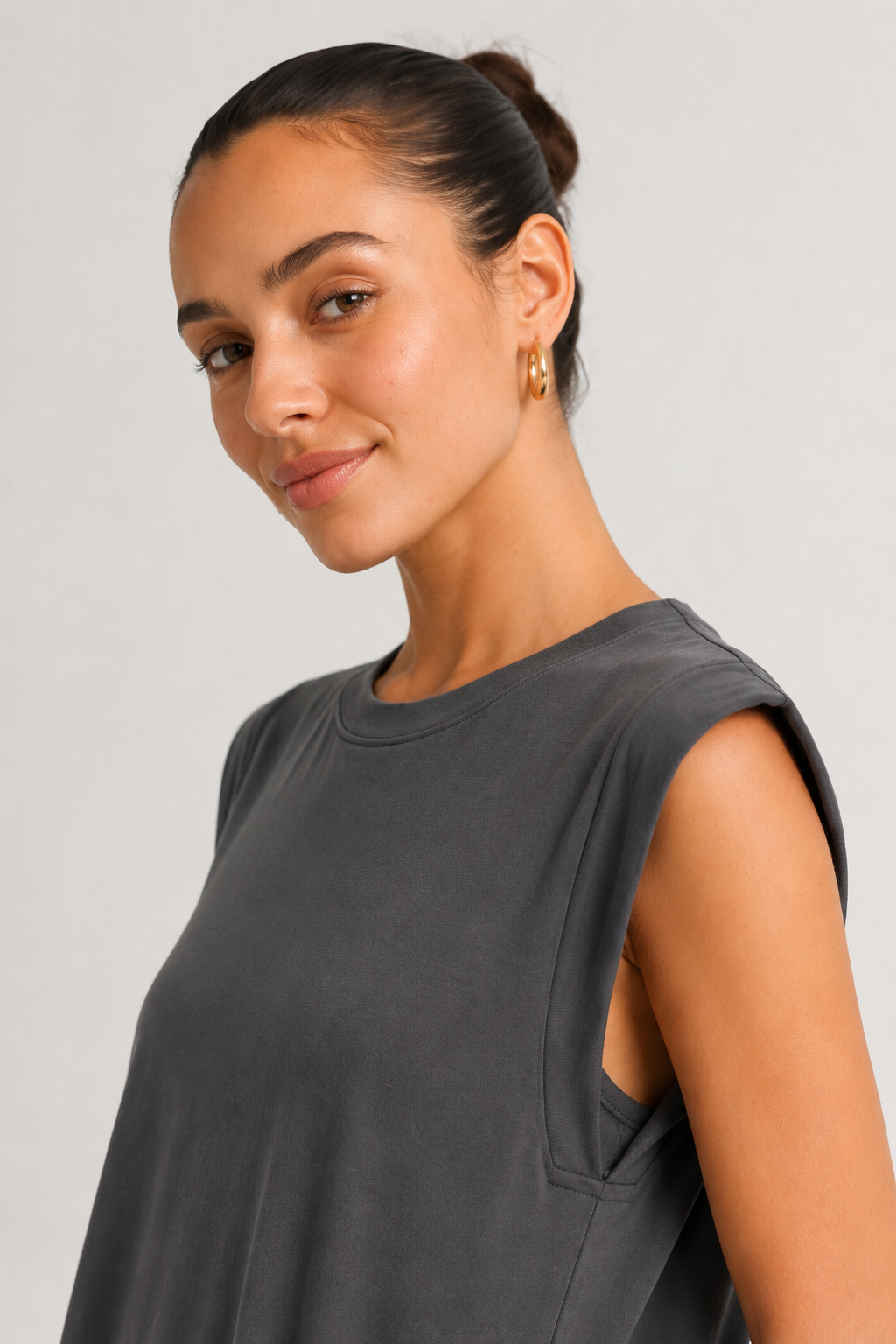 Professional studio shot of a model wearing the Lohnr Rowan Midi dress in Slate, featuring a premium relaxed drape and side split hem.