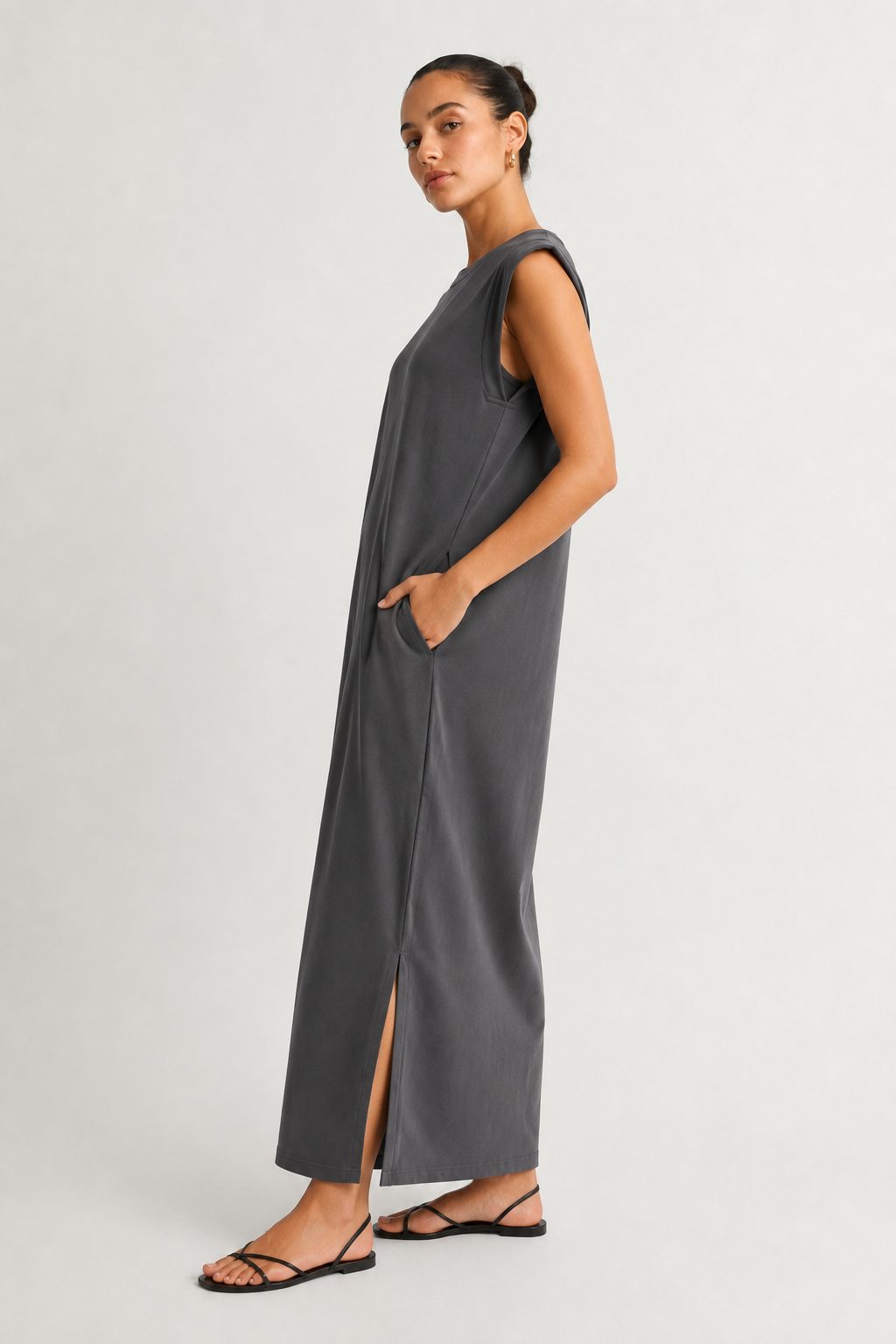 Professional studio shot of a model wearing the Lohnr Rowan Midi dress in Slate, featuring a premium relaxed drape and side split hem.