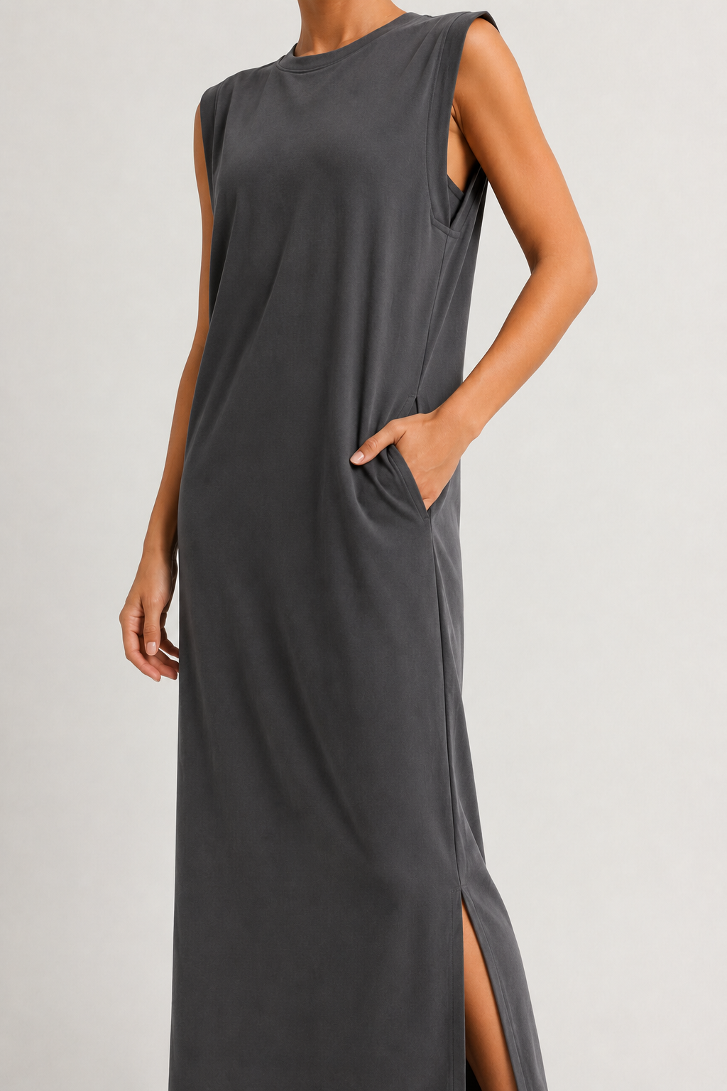 Professional studio shot of a model wearing the Lohnr Rowan Midi dress in Slate, featuring a premium relaxed drape and side split hem.
