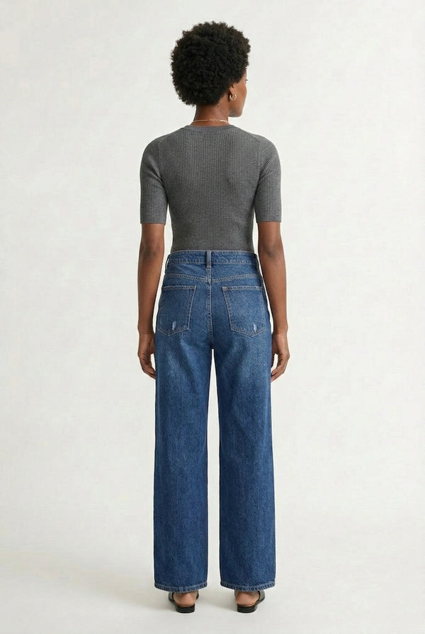 LOHNR Rowe Relaxed Jean. A structured, mid-to-high rise straight-leg denim pant featuring subtle distressed detailing and a classic five-pocket design.
