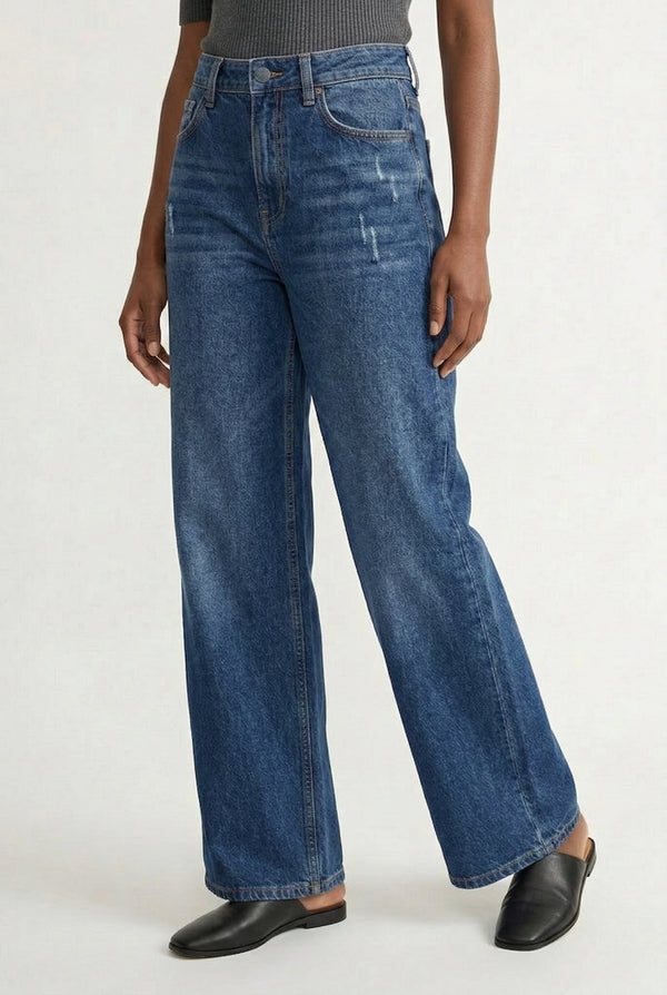 LOHNR Rowe Relaxed Jean. A structured, mid-to-high rise straight-leg denim pant featuring subtle distressed detailing and a classic five-pocket design.