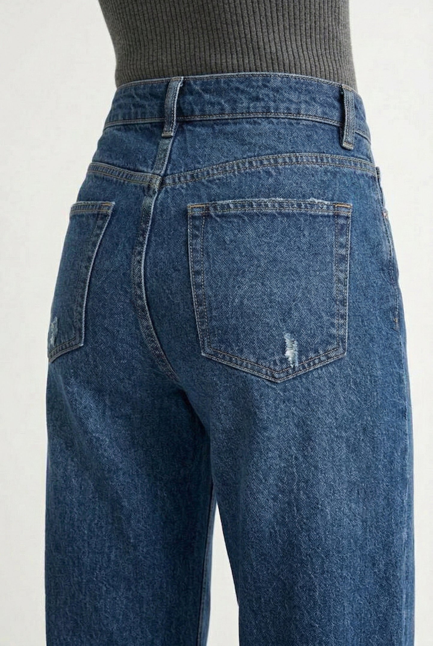 LOHNR Rowe Relaxed Jean. A structured, mid-to-high rise straight-leg denim pant featuring subtle distressed detailing and a classic five-pocket design.