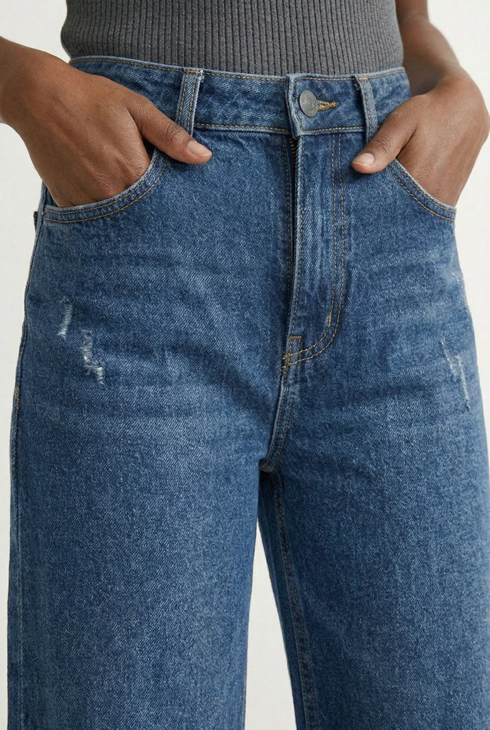 LOHNR Rowe Relaxed Jean. A structured, mid-to-high rise straight-leg denim pant featuring subtle distressed detailing and a classic five-pocket design.