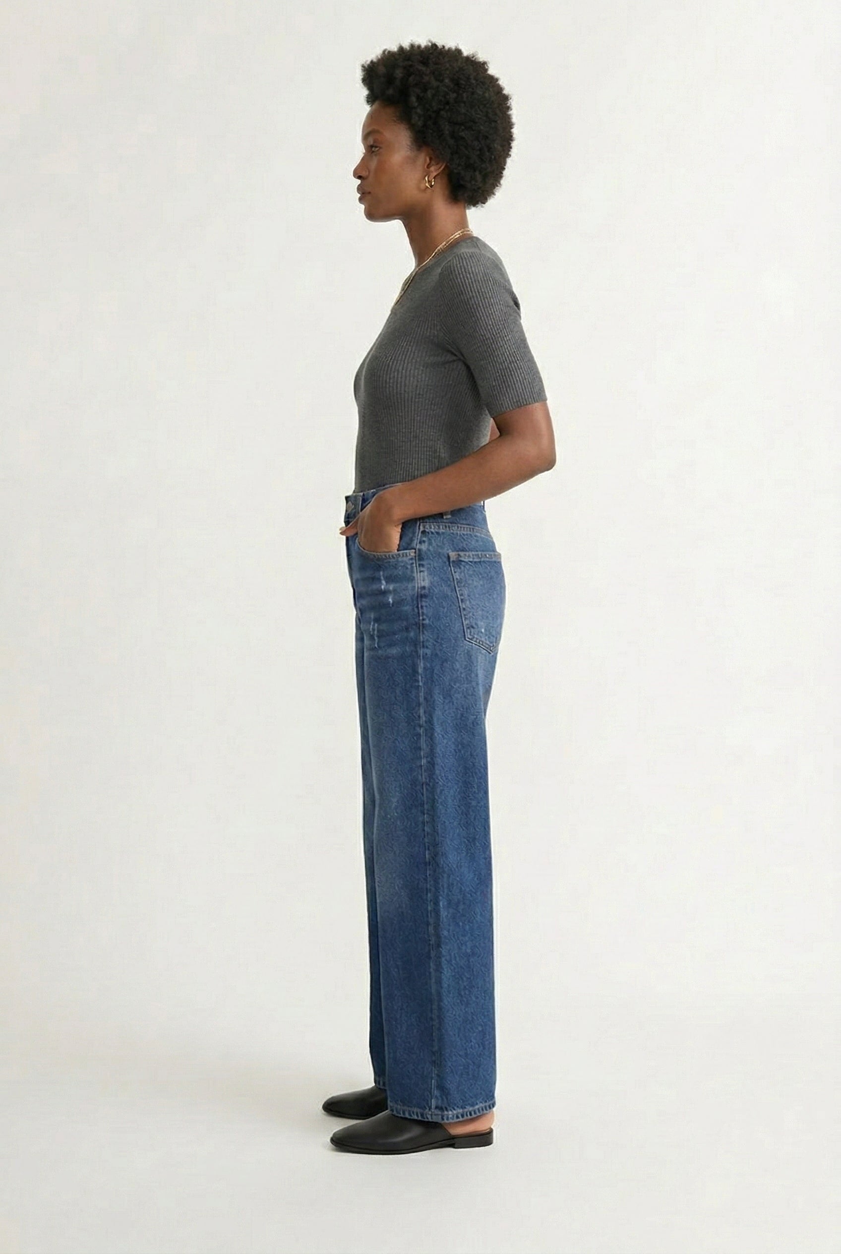 LOHNR Rowe Relaxed Jean. A structured, mid-to-high rise straight-leg denim pant featuring subtle distressed detailing and a classic five-pocket design.