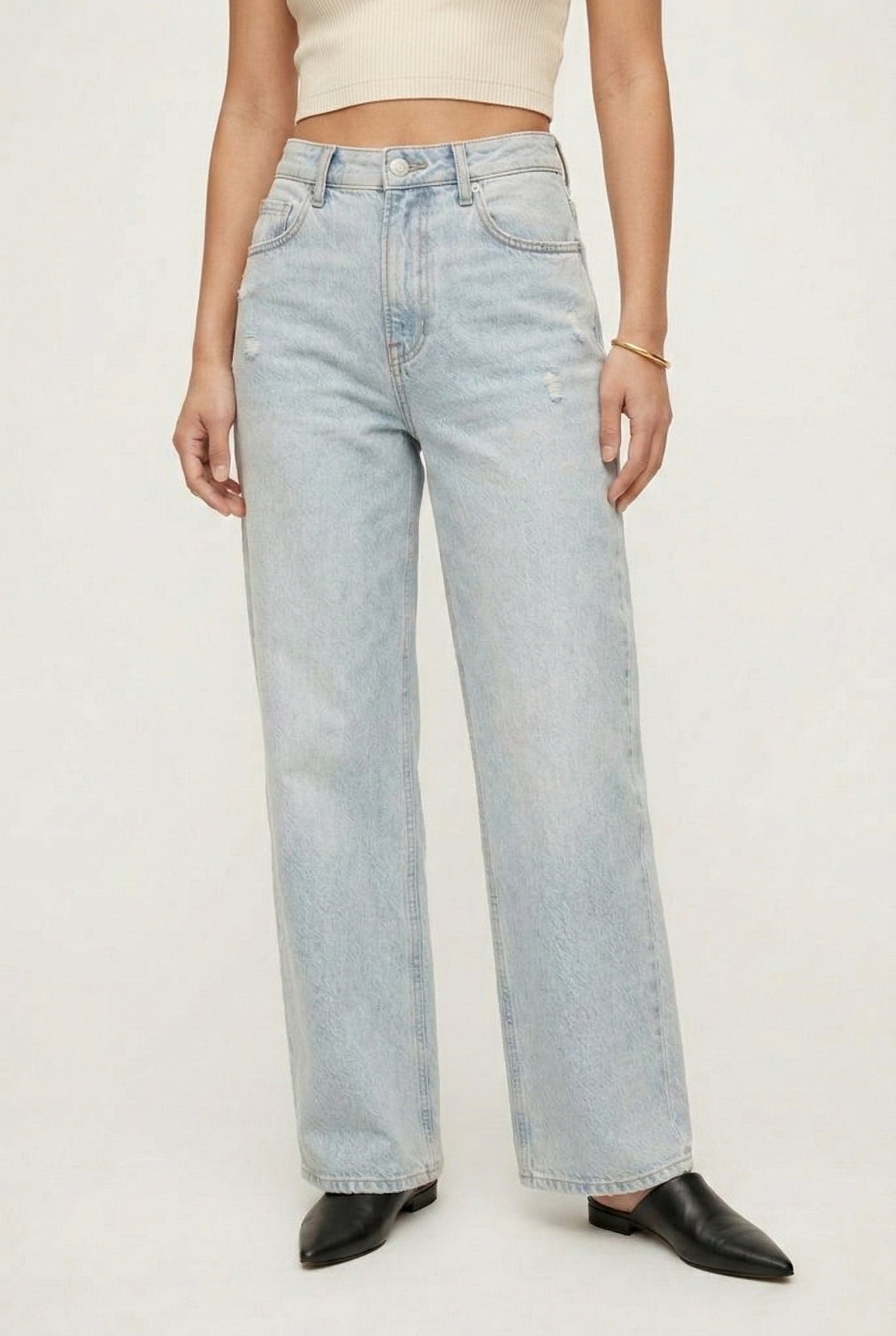 LOHNR Rowe Relaxed Jean. A structured, mid-to-high rise straight-leg denim pant featuring subtle distressed detailing and a classic five-pocket design.