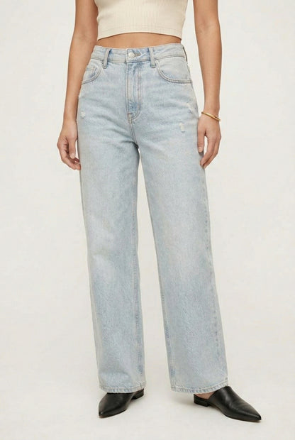 LOHNR Rowe Relaxed Jean. A structured, mid-to-high rise straight-leg denim pant featuring subtle distressed detailing and a classic five-pocket design.