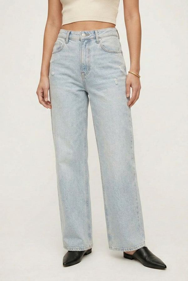 LOHNR Rowe Relaxed Jean. A structured, mid-to-high rise straight-leg denim pant featuring subtle distressed detailing and a classic five-pocket design.