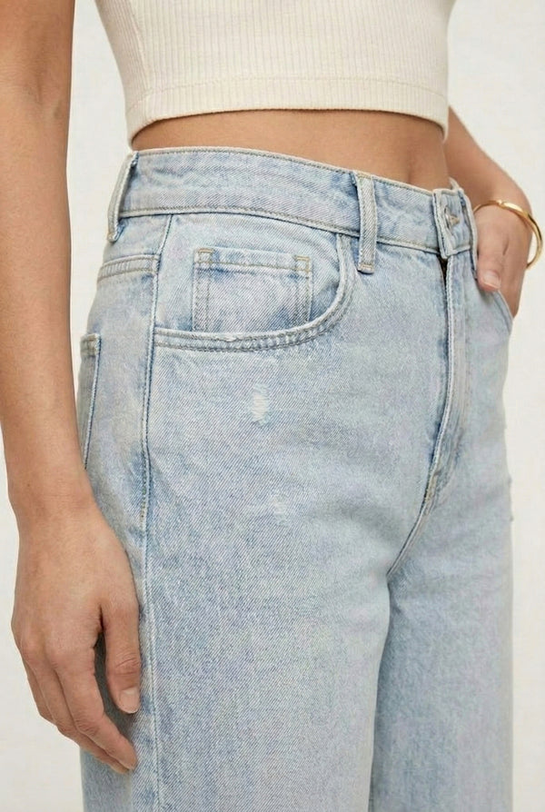 LOHNR Rowe Relaxed Jean. A structured, mid-to-high rise straight-leg denim pant featuring subtle distressed detailing and a classic five-pocket design.