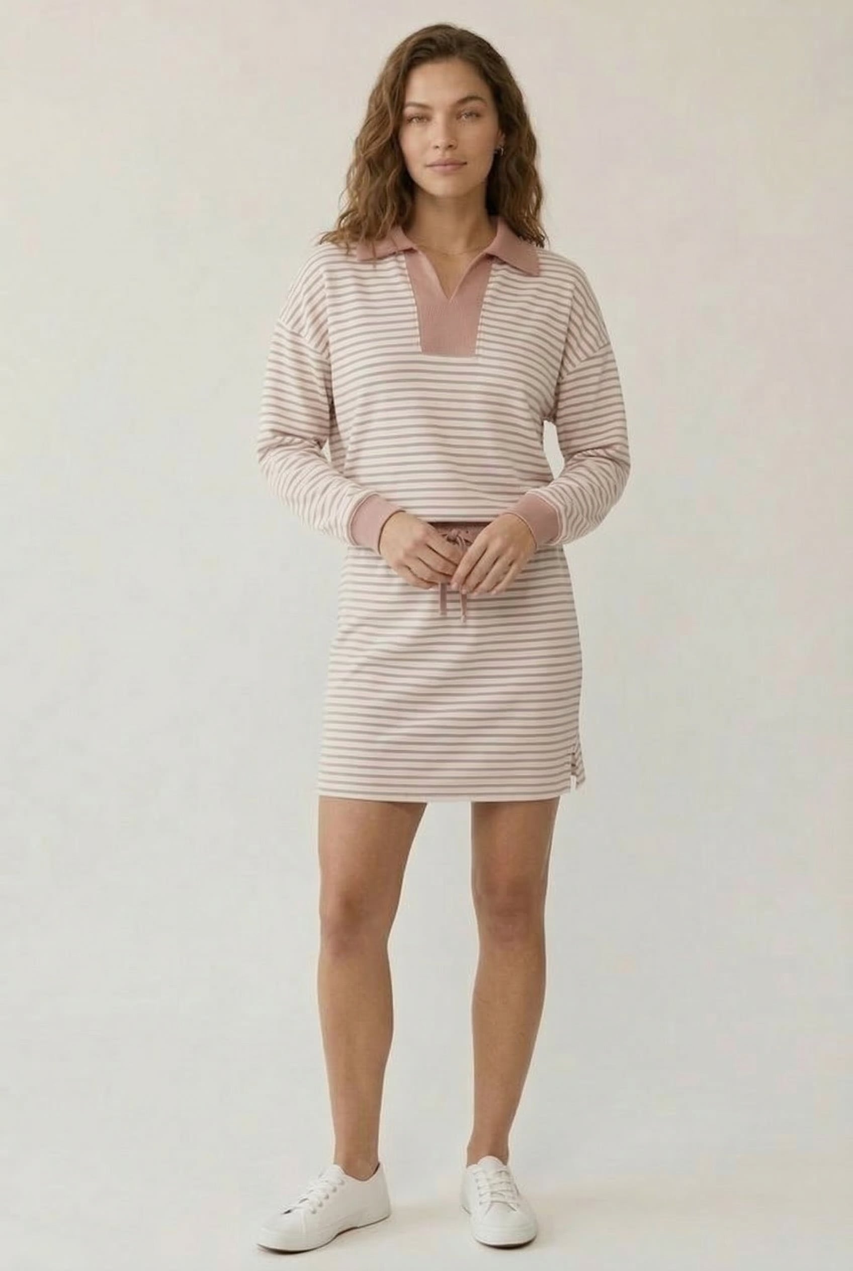 #9c7061